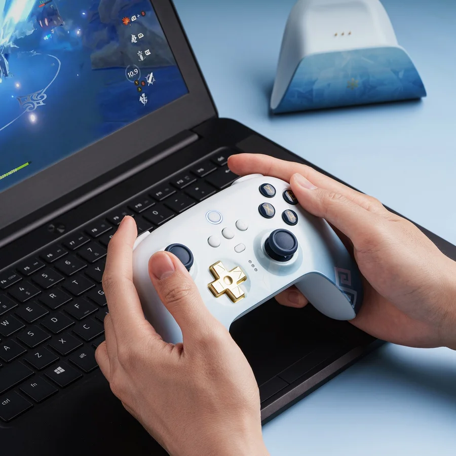 Controle sem fio branco com base de carregamento